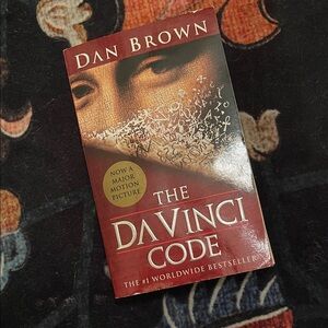 The Da Vinci Code by Dan Brown (paperback)